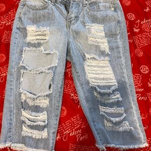 distressed long jean shorts.